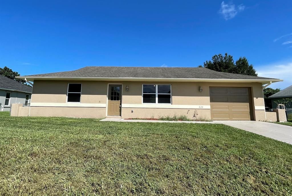 Photo of 629 SE Dean Terrace, Port Saint Lucie, FL 34953 (MLS # R10747827)