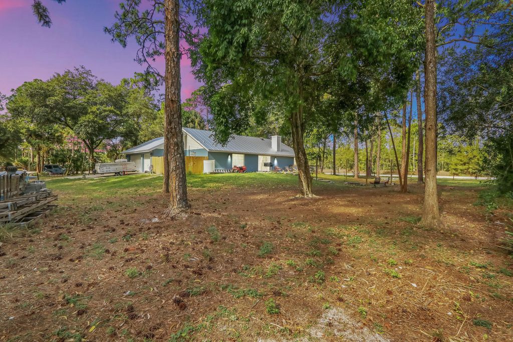 Photo of 16971 W Grand National Drive, Loxahatchee, FL 33470 (MLS # R10800782)