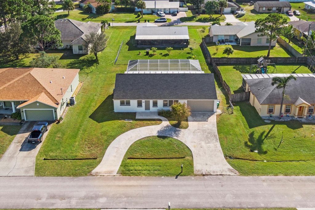 Photo of 408 SW Holden Terrace, Port Saint Lucie, FL 34984 (MLS # R10944506)