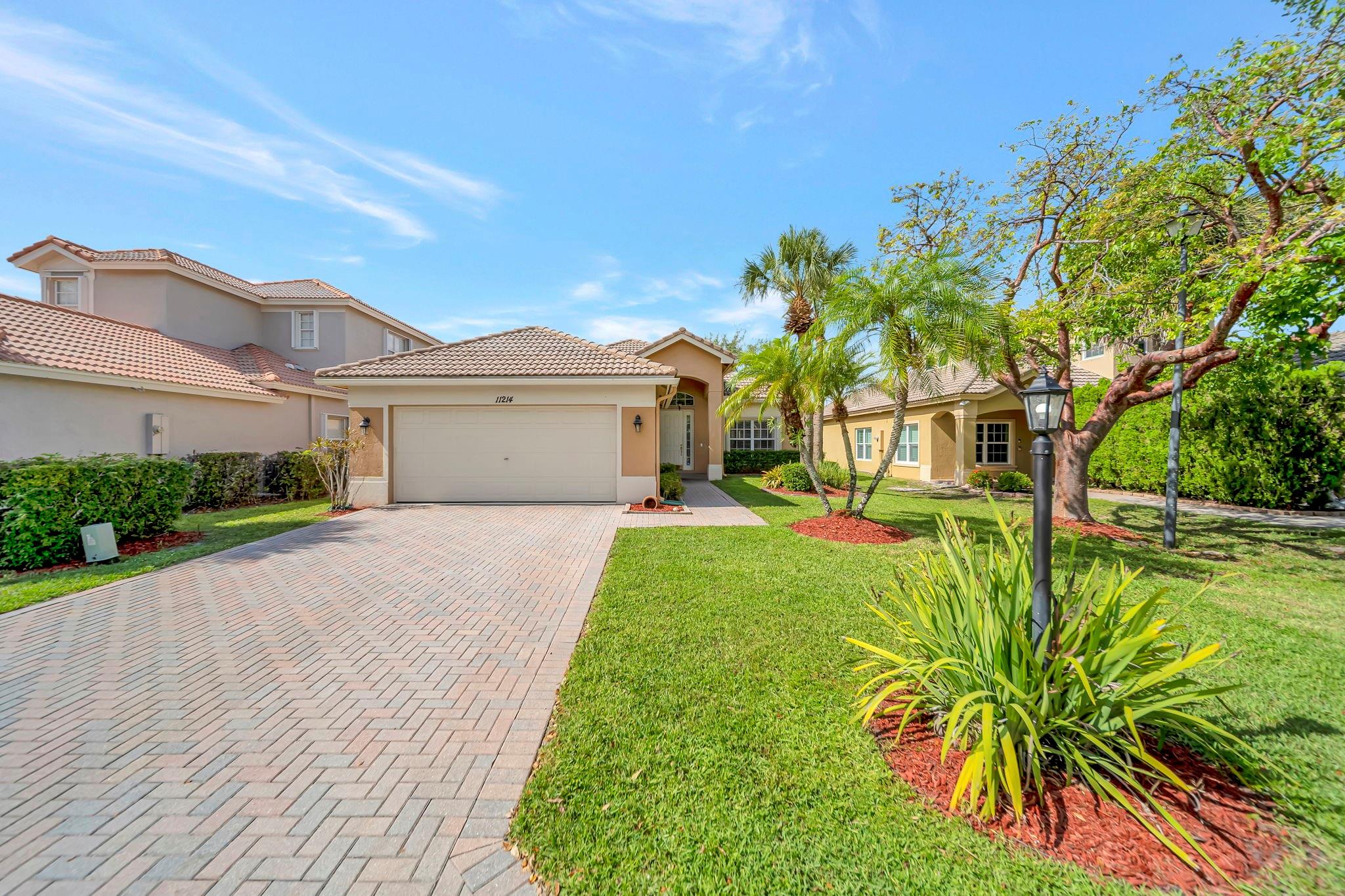 PARKLAND ISLES IS A GUARD GATED COMMUNITY OF SINGLE FAMILY HOMES LOCATED IN THE DESIRABLE CITY OF PARKLAND FLORIDA WITH A-RATED SCHOOL SYSTEM. MOVE INTO THIS BEAUTIFUL UPDATED 3 BEDROOM 2 BATH LAKEFRONT HOME IN PRESTIGIOUS PARKLAND ISLES. HOME FEATURES KITCHEN WITH GRANITE COUNTERTOPS, PANTRY, NEWER SS APPLIANCES. MASTER BEDROOM HAS TWO WALK IN CLOSETS WITH BUILT INS. TRAY CEILINGS , TWO VANITIES IN MASTER BATHROOM WITH SEPARATE REHABBED SHOWER AND ROMAN TUB. TILED THROUGHOUT MAIN AREA. TWO BEDROOMS ARE CARPETED, THIRD BEDROOM HAS LAMINATE FLOORING. NEW A/C, NEW HOT WATER HEATER, NEW WASHER/DRYER, NEW BLINDS, GARAGE FULLY REPAINTED, 2 FLAT SCREEN TVS INCLUDED. WHOLE HOUSE HAS
HURRICANE ACCORDIAN SHUTTERS. FRENCH DOORS LEADING OUT TO THE LAKEVIEW SCREENED PATIO. PERFECT FAMILY HOME