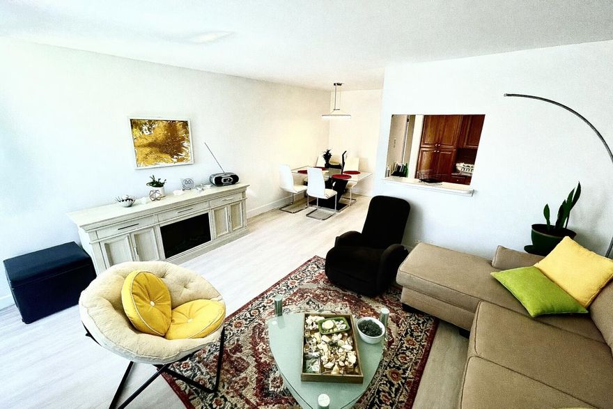 Your Golden Opportunity - Priced Below Investment! Modern. Move-in ready 1BR/1BA in Century Village East 55+ — priced for a fast, no-nonsense cash sale. This beautifully updated condo offers exceptional value with upgrades already done for you: new LVP flooring & 6" baseboards, smooth ceilings (popcorn removed), new A/C, new easy open interior door handles & front door lockset, updated light switches &much more! -Major structural improvements are already completed, including a new roof, concrete restoration, and fresh exterior paint — NO SPECIAL ASSESSMENTS! Close to clubhouse, two pools, bus stop with convenient elevator access to your 2nd floor to bring up your groceries, suitcases, etc. Brand new common area patio waiting on furniture &landscape, perfect for relaxing or entertaining.  Pink bedroom drapes are not included in sale.