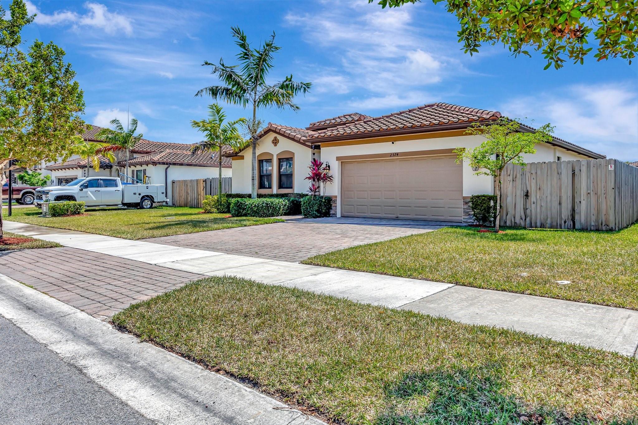 Low HOA. LOW 2.75% Assumable VA mortgage.
Beautiful 4Bed/3bath home with 2 car garage in the gated Portovita Community. Constructed in 2020. Spacious, open/ split floorplan with a 1Bed/1bath/living area as an In-law or older teen suite. The bedrooms are spacious with walk-in closet the main bedroom. The kitchen features quartz and stainless appliances. Higher-end Samsung Washer and Dryer are included. A second refrigerator in the garage is included. Front Lawn Maintenance Included w/HOA. Fully fenced side and back yard.
The Clubhouse is "fob" accessed with fitness center, pool and covered deck area. Inside is a beautiful lounging area, kitchen area.
Close to Shopping, Dining, Homestead-Miami Speedway, Biscayne National Park
Greenway bike/walk path