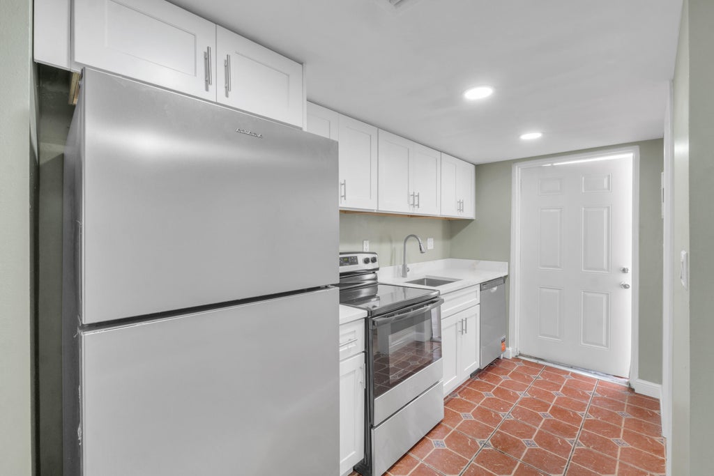 Photo of 4171 NW 26TH Street #T2, Lauderhill, FL 33313 (MLS # B26075396)