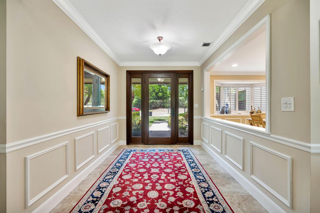 Photo of 11 Berwick Road NE, Palm Beach Gardens, FL 33418 (MLS # R11119784)