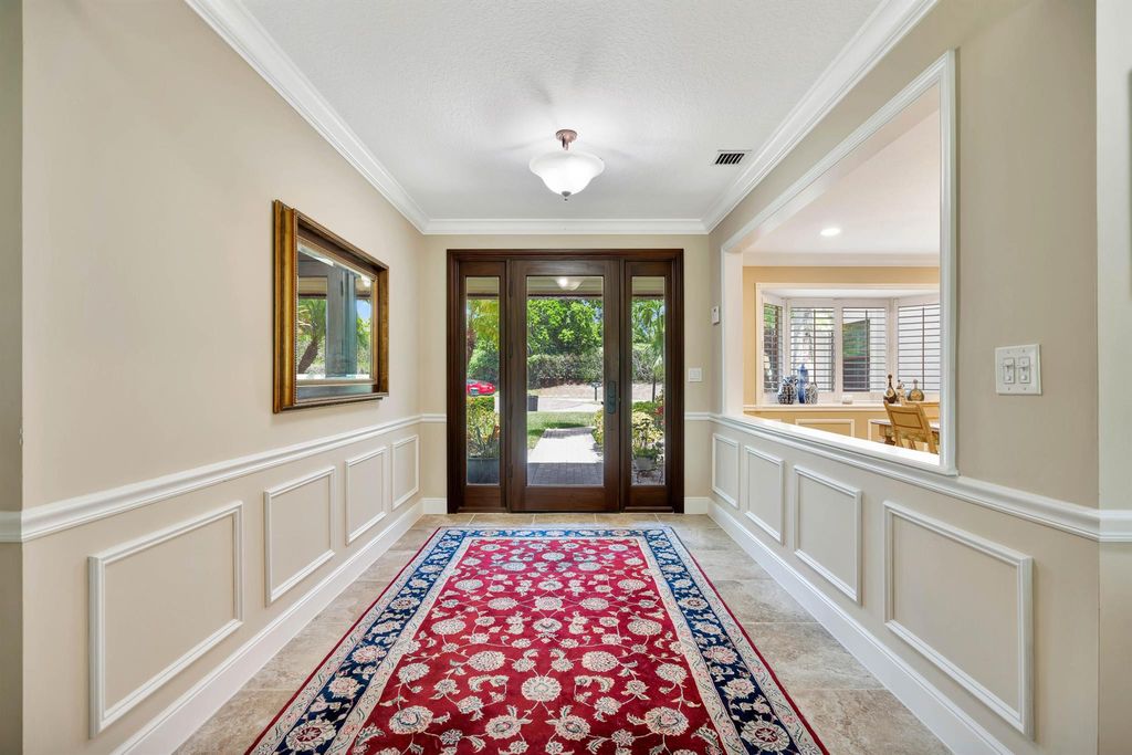 Photo of 11 Berwick Road NE, Palm Beach Gardens, FL 33418 (MLS # R11119784)