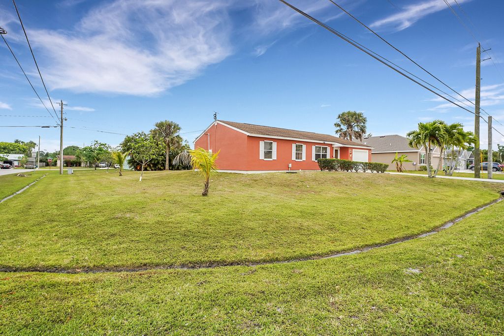 Photo of 2698 SE Melaleuca Boulevard, Port Saint Lucie, FL 34952 (MLS # R10978197)