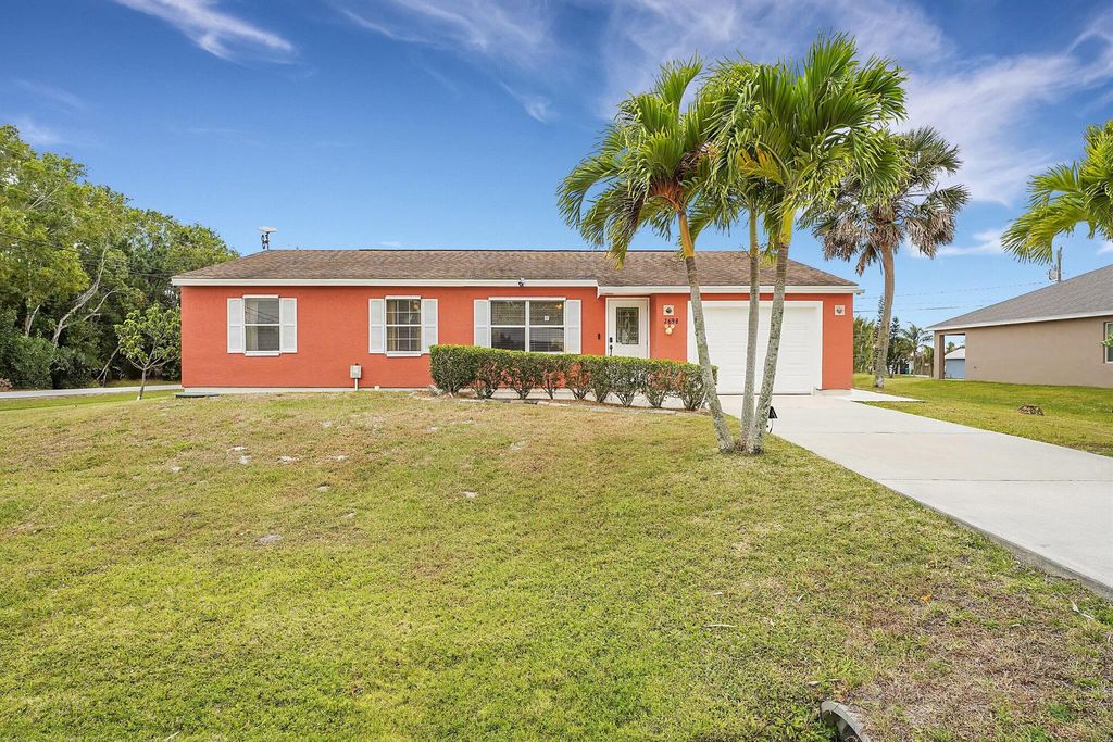 Photo of 2698 SE Melaleuca Boulevard, Port Saint Lucie, FL 34952 (MLS # R10978197)