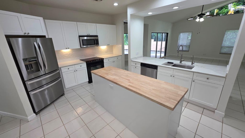 Photo of 6118 CREEKSIDE Trail, Jupiter, FL 33458 (MLS # B26058889)