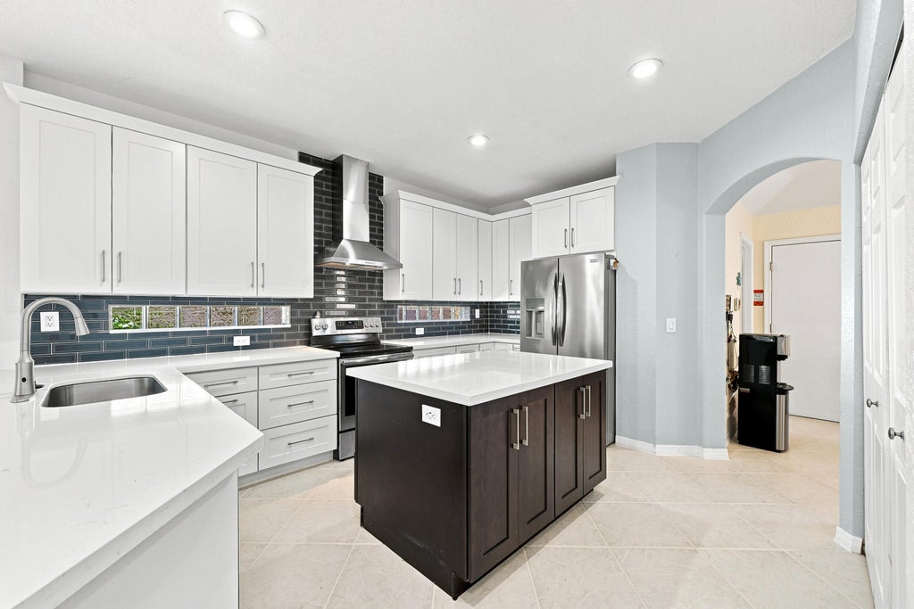 Photo of 12115 NW 52nd Court, Coral Springs, FL 33076 (MLS # B26051986)