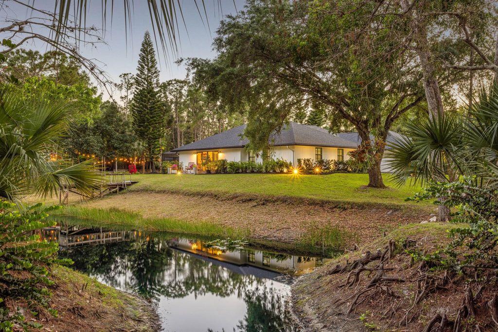 Photo of 9544 Mockingbird Trail, Jupiter, FL 33478 (MLS # R11091955)