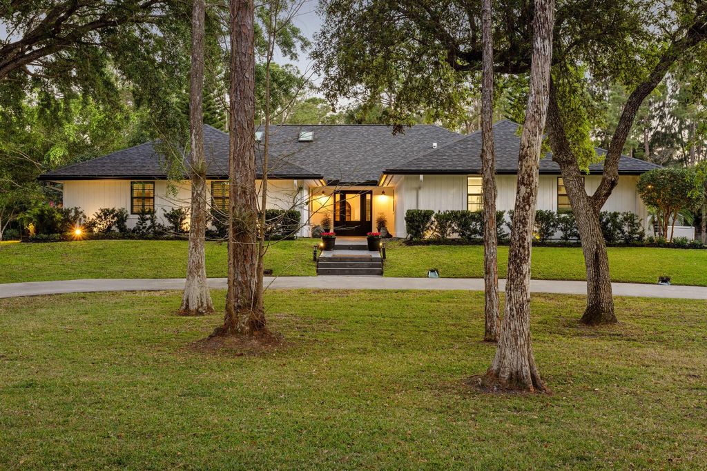 Photo of 9544 Mockingbird Trail, Jupiter, FL 33478 (MLS # R11091955)