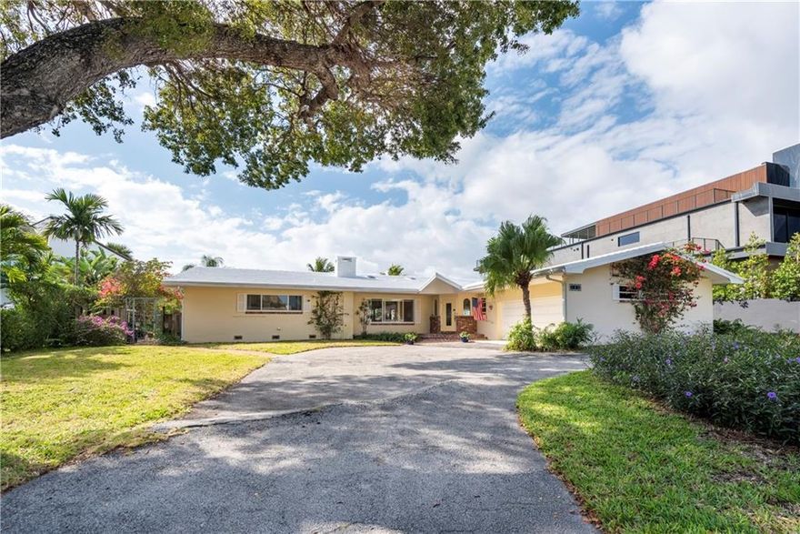 Located in the very desirable Sunrise Intracoastal neighborhood, a gated community with a security patrol and community park, this home sits on a generous lot on the Middle River. It offers deep water access, a spectacular view of yachts as well as the beautiful surrounding area, and privacy. Nearby Bayview Elementary School, one of the most highly ranked in Florida, adds to the desirability of the neighborhood. Easy walks to the beach and Birch State Park, an urban oasis nestled between the ocean and Intracoastal Waterway, make this home perfect for active lifestyles. This charming, classic Florida home with unique appointments such as hand painted Italian tile floors throughout, cathedral ceilings and lots of windows that capture the incredible wide water views, is a rare gem.