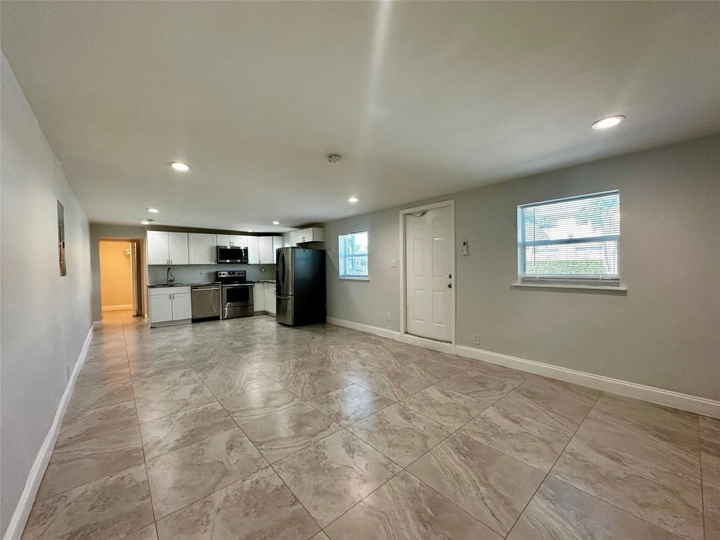 Photo of 1279 NE 40th Place #1, Oakland Park, FL 33334 (MLS # F10474703)