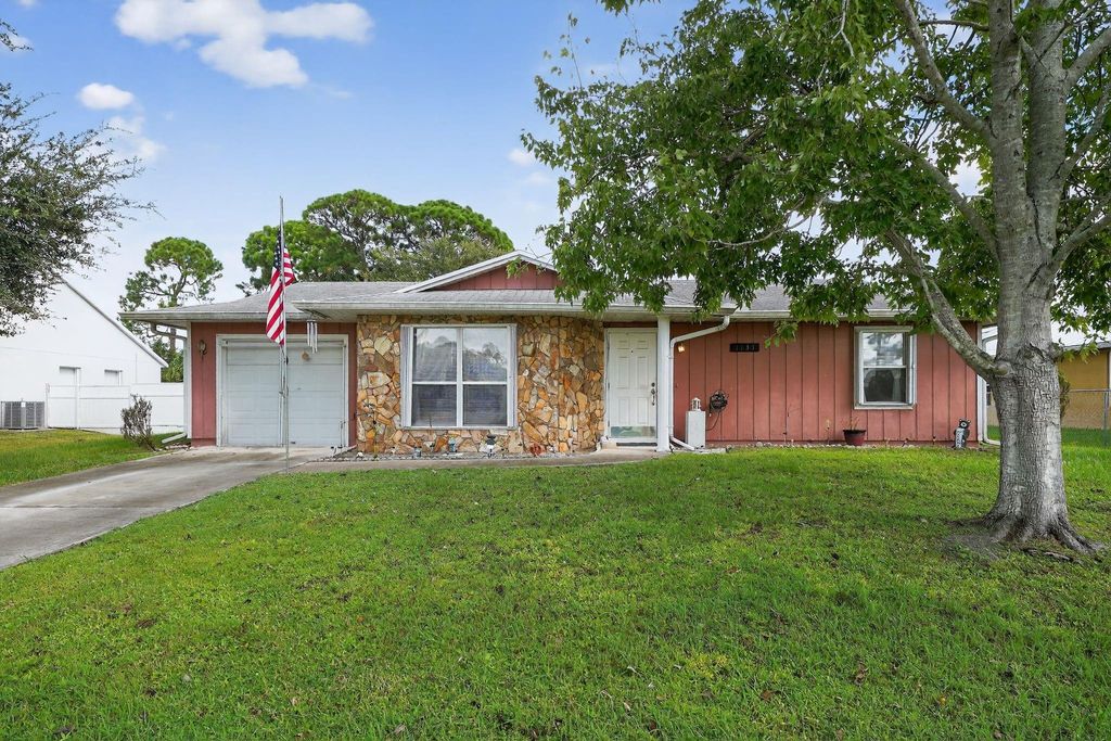 Photo of 1131 SW Coleman Avenue, Port Saint Lucie, FL 34953 (MLS # F10529221)