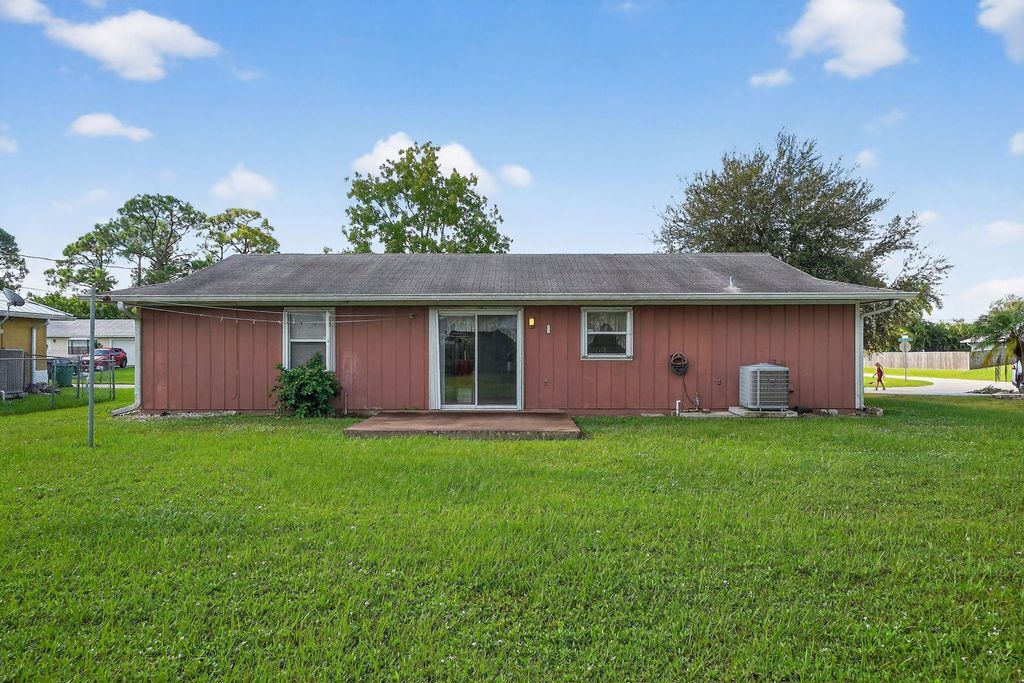 Photo of 1131 SW Coleman Avenue, Port Saint Lucie, FL 34953 (MLS # F10529221)