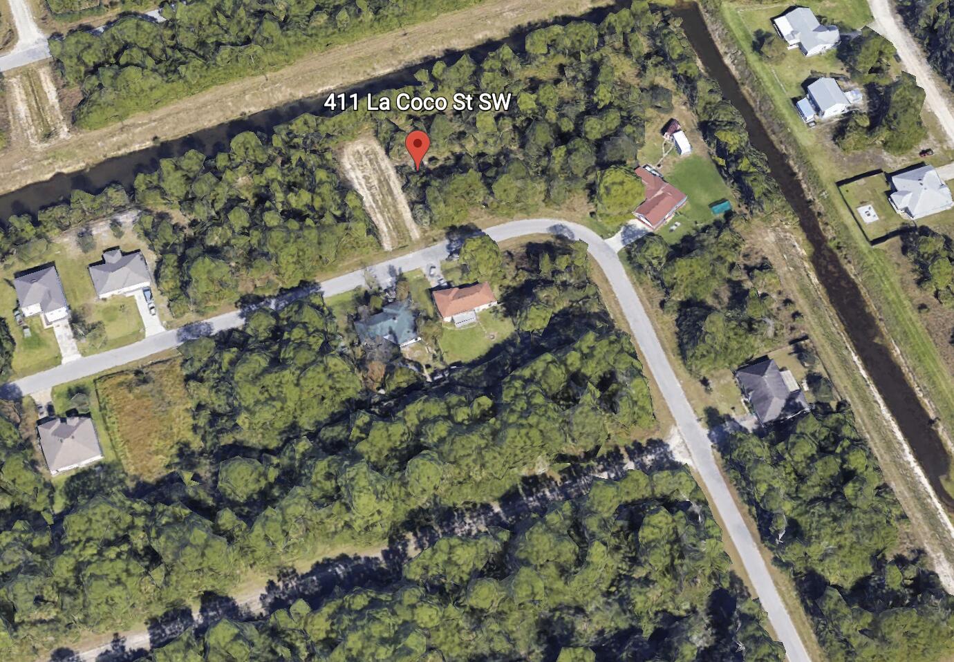 Buildable lot in Palm Bay that backs up to a canal which means no neighbors directly behind.