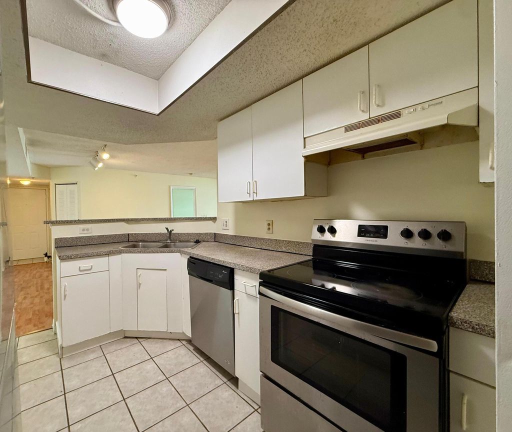 Photo of 5065 Wiles Road #204, Coconut Creek, FL 33073 (MLS # B26019605)