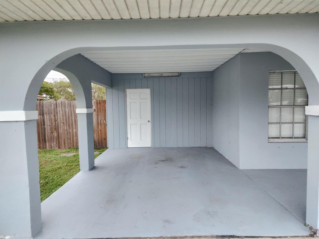 Photo of 631 SW Curry Street, Port Saint Lucie, FL 34983 (MLS # R11039614)