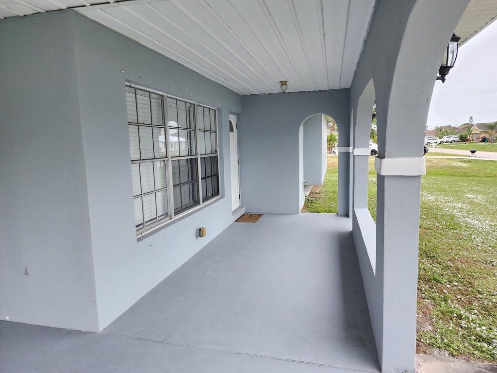 Photo of 631 SW Curry Street, Port Saint Lucie, FL 34983 (MLS # R11039614)