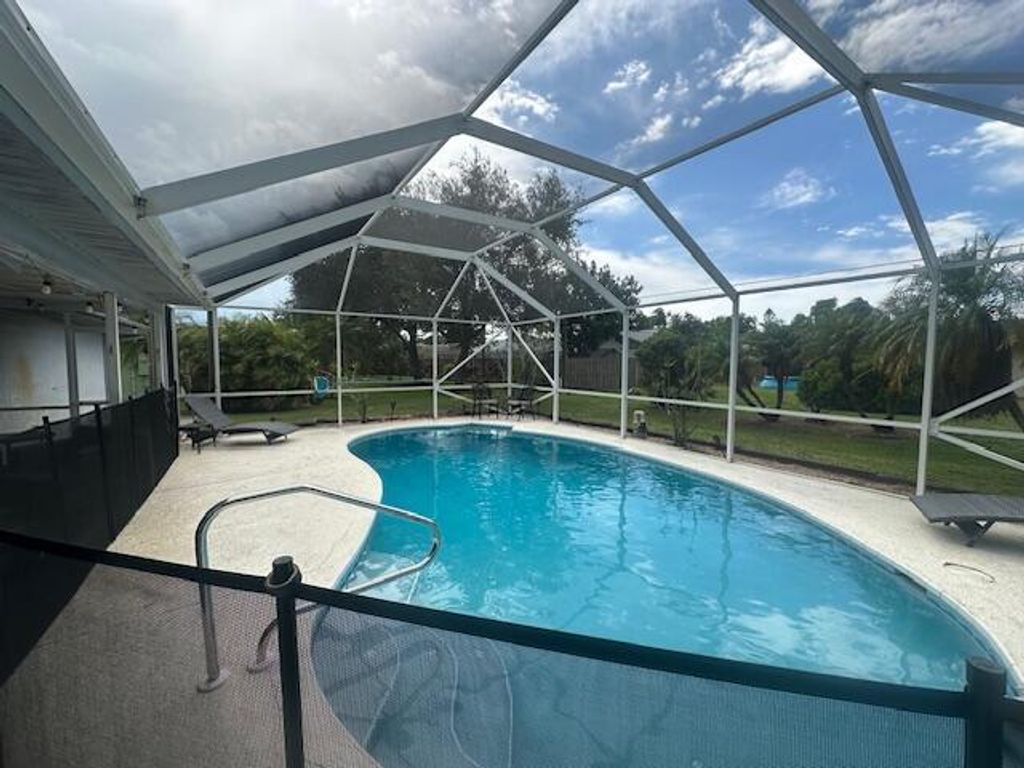 Photo of 1366 SE Concha Street, Port Saint Lucie, FL 34983 (MLS # R11120119)