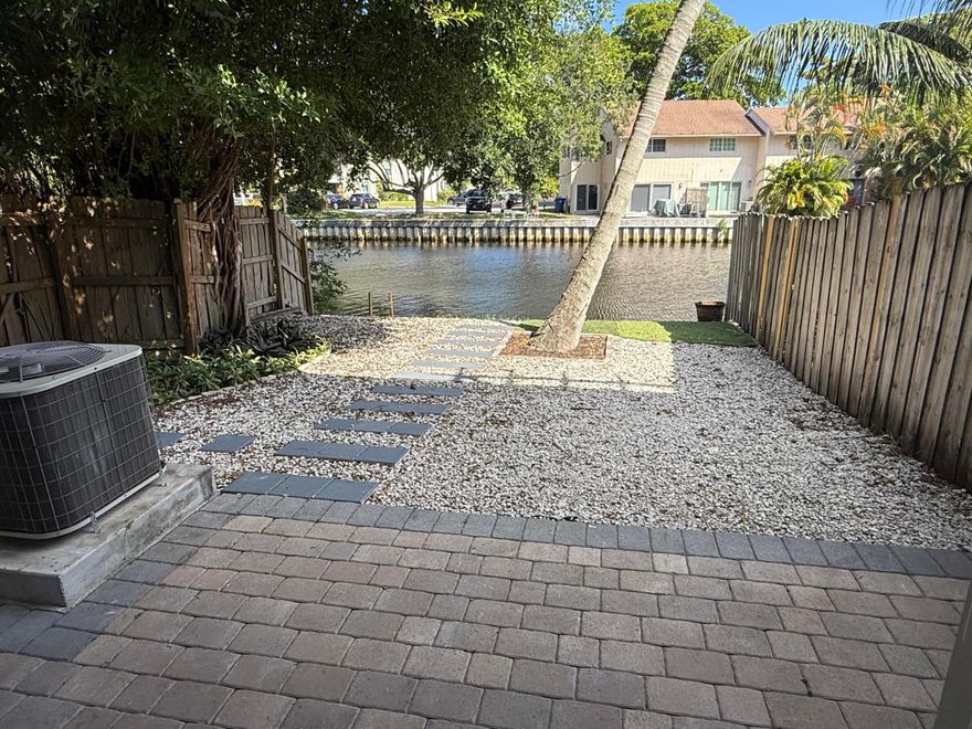 Beautiful and spacious corner townhouse on the water in the heart of Wilton Manors. Contemporary design with porcelain and hardwood floors throughout—no carpet. The expansive backyard overlooks a peaceful canal, perfect for relaxing or entertaining. Walk to the top restaurants, shops, and markets. Fast approval. Unique rental in a prime location. Move in with only 2 months if your credit is excellent. Washer/dryer in unit, tons of natural light, open layout, and plenty of storage. Pet-friendly with approval. Available on May 01, 2026. Need a 24-hour notice to show.