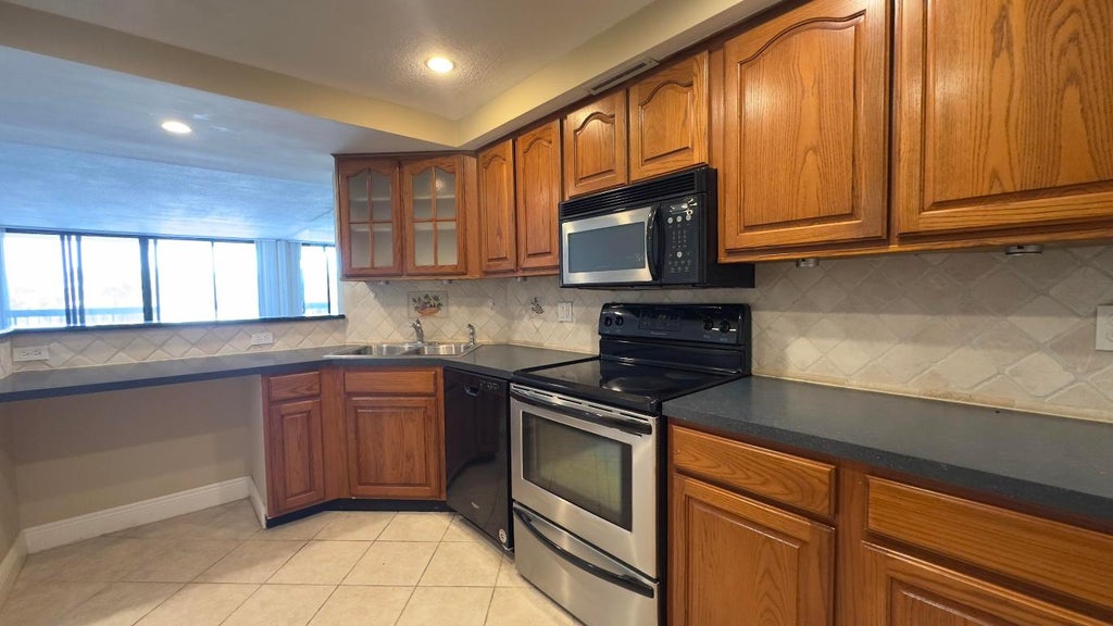 Photo of 2425 Presidential Way #203, West Palm Beach, FL 33401 (MLS # R11147336)