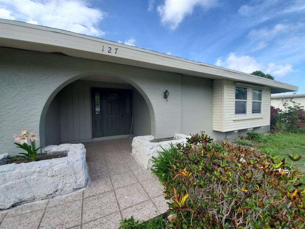 Photo of 127 NE Lobster Road, Port Saint Lucie, FL 34983 (MLS # R10726313)