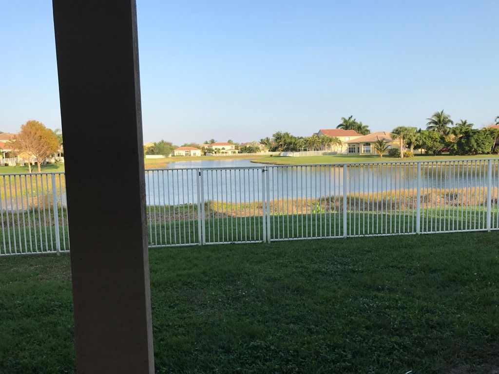 Photo of 6292 Shadow Tree Lane, Lake Worth, FL 33463 (MLS # B26022110)