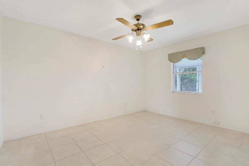 Photo of 470 SE Nome Drive, Port Saint Lucie, FL 34984 (MLS # R10970780)