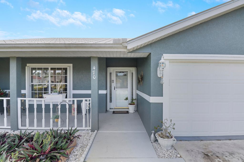 Photo of 470 SE Nome Drive, Port Saint Lucie, FL 34984 (MLS # R10970780)