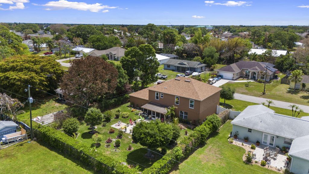 Photo of 233 SW Christmas Terrace, Port Saint Lucie, FL 34984 (MLS # B26019189)