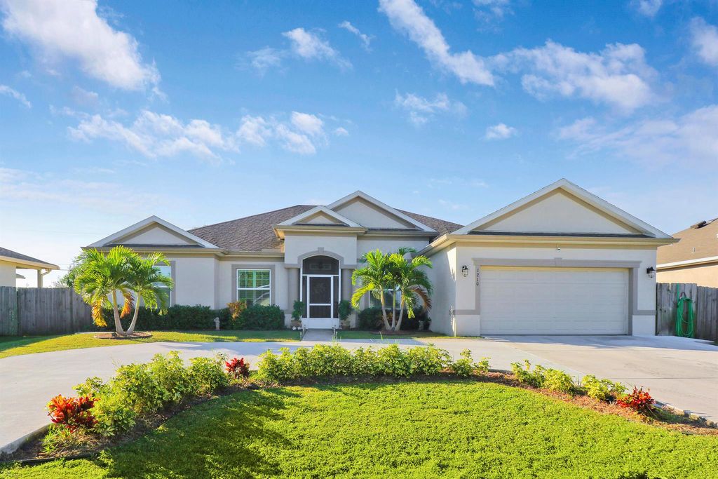 Photo of 1210 SW Albenga Avenue, Port Saint Lucie, FL 34953 (MLS # R10934396)