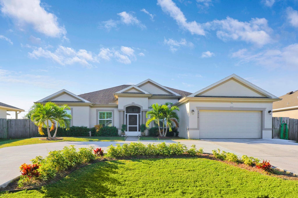 Photo of 1210 SW Albenga Avenue, Port Saint Lucie, FL 34953 (MLS # R10934396)