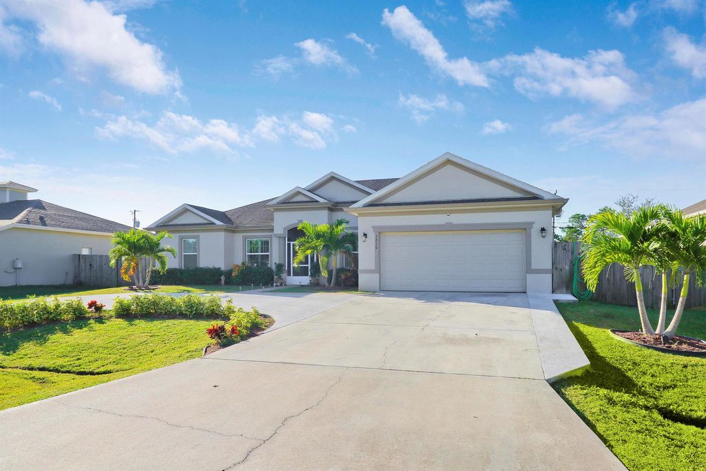 Photo of 1210 SW Albenga Avenue, Port Saint Lucie, FL 34953 (MLS # R10934396)