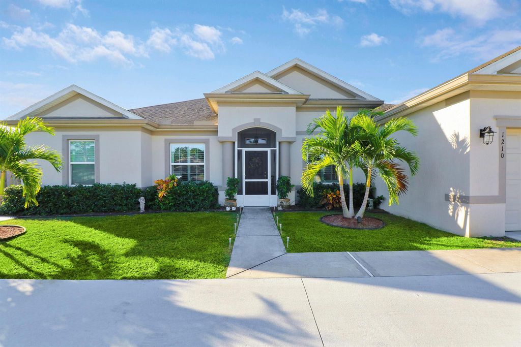 Photo of 1210 SW Albenga Avenue, Port Saint Lucie, FL 34953 (MLS # R10934396)