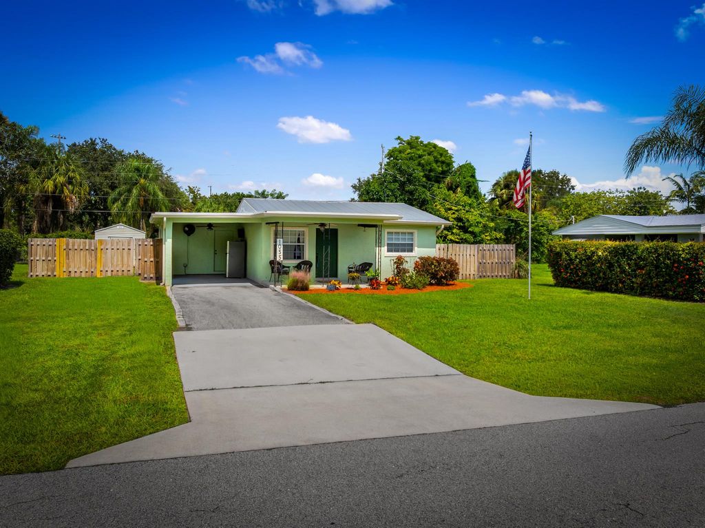 Photo of 1055 SW All American Boulevard, Palm City, FL 34990 (MLS # R11126847)