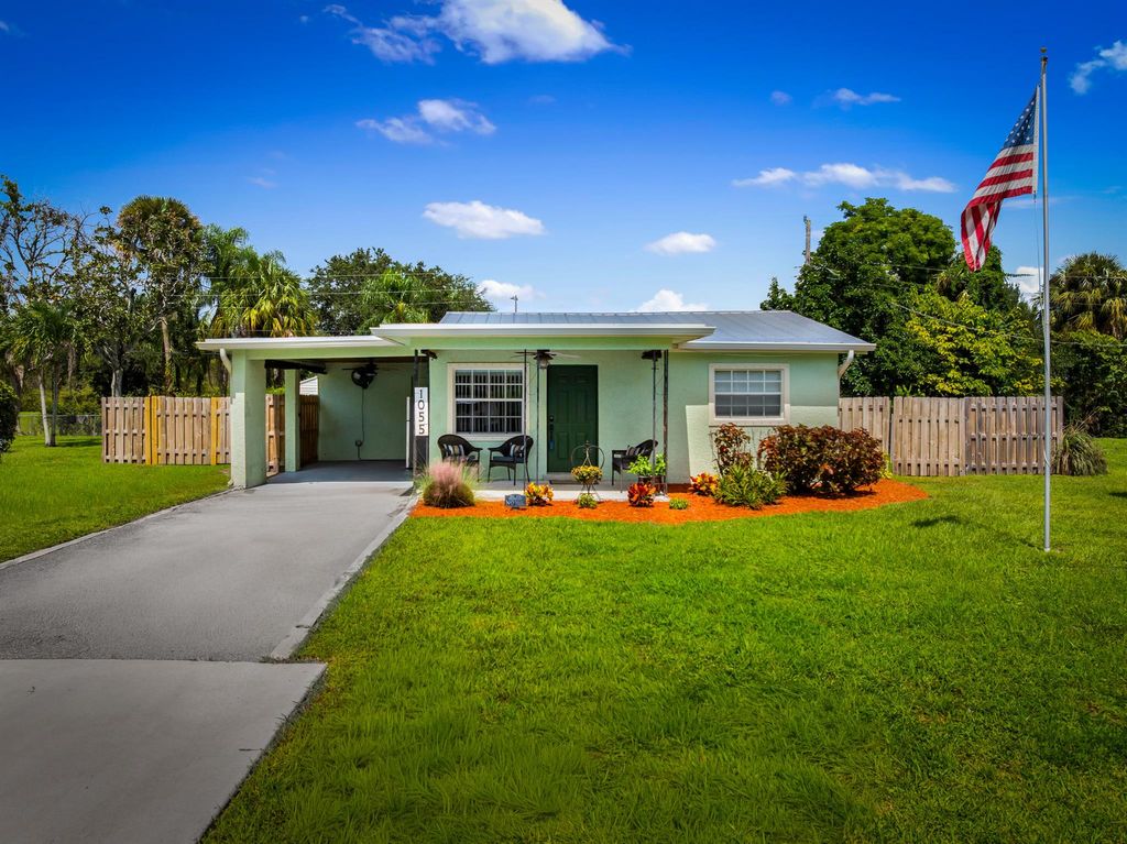 Photo of 1055 SW All American Boulevard, Palm City, FL 34990 (MLS # R11126847)