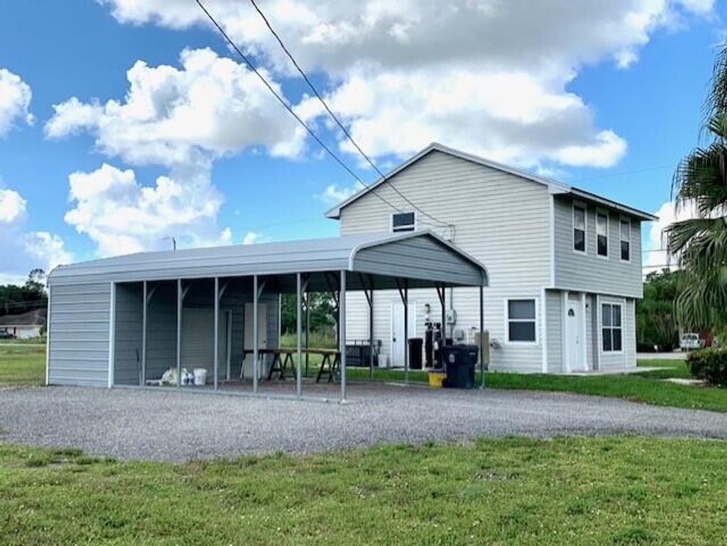 Photo of 13502 76th Road N, West Palm Beach, FL 33412 (MLS # R10950544)