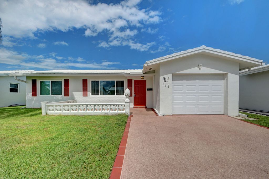 Photo of 712 SW 16th Street, Boynton Beach, FL 33426 (MLS # R11021987)