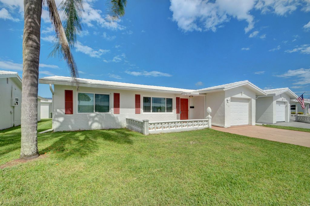 Photo of 712 SW 16th Street, Boynton Beach, FL 33426 (MLS # R11021987)
