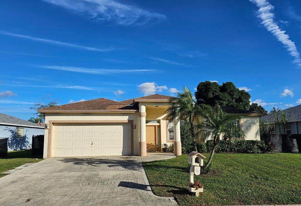 Photo of 1338 Cape May Lane, Greenacres, FL 33413 (MLS # R10938153)