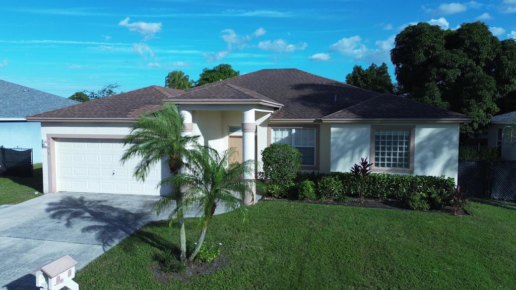 Photo of 1338 Cape May Lane, Greenacres, FL 33413 (MLS # R10938153)