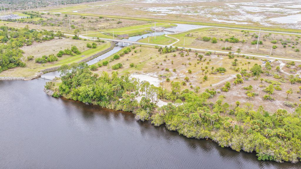 Photo of 0 SW Citrus Boulevard S, Palm City, FL 34990 (MLS # B26021023)