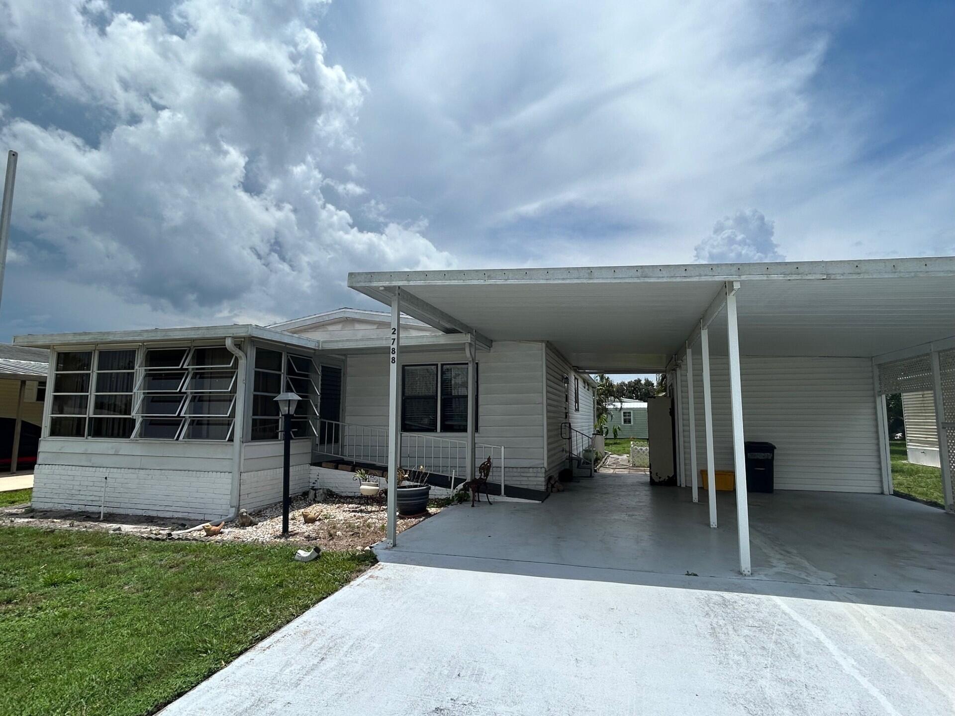 Great opportunity to own a prime location in sought-after St. Lucie Falls! Close to everything, this home is in paradise. Property is for sale at land value due to condition of mobile home. Home needs total restoration.