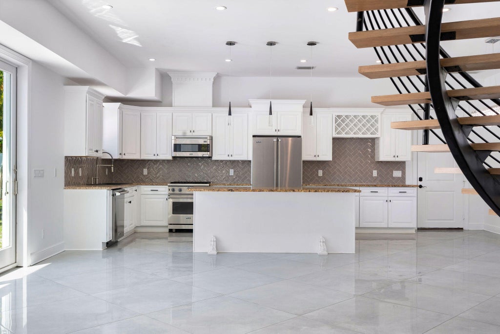 Photo of 100 NORWOOD Road, Jupiter, FL 33469 (MLS # B26070124)