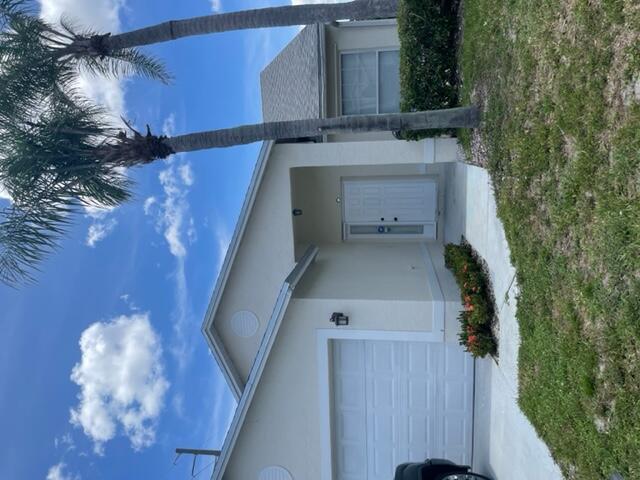 Beautifully renovated home featuring 3 bedrooms/ 2 baths & 2 car garage. Kitchen recently remodeled , newer appliances, including front loading washer/dryer and AC. Tile in all rooms except main bedroom that has wood floors. Bathrooms also newly renovated. Beautiful water views of the lake in the backyard. 2 car garage! Don't miss this great home in the much sought after Boynton Lakes. Conveniently located close to I-95, shopping & anything you may want to do!Information is deemed to be reliable, but is not guaranteed.