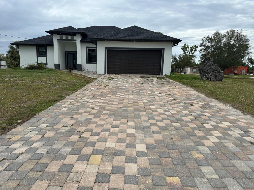 Photo of 3401 Sand Road, Cape Coral, FL 33993 (MLS # F10549697)
