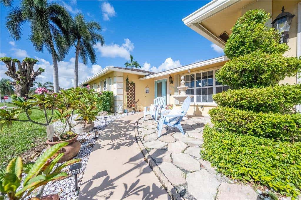 Photo of 2951 Via Vizcaya, Lake Worth Beach, FL 33461 (MLS # R10731991)