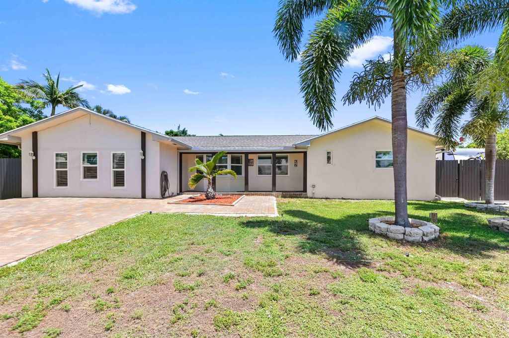 Photo of 26 W Pine Tree Avenue, Lake Worth, FL 33467 (MLS # R11093213)