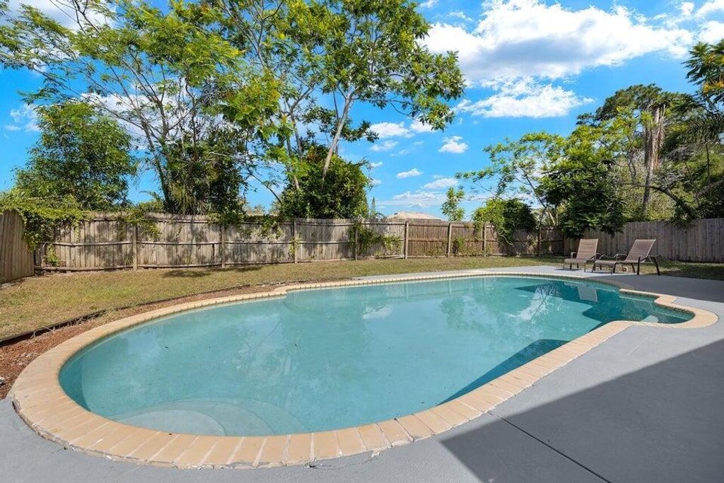 Photo of 2542 SW Warwick Street, Port Saint Lucie, FL 34984 (MLS # R11002235)